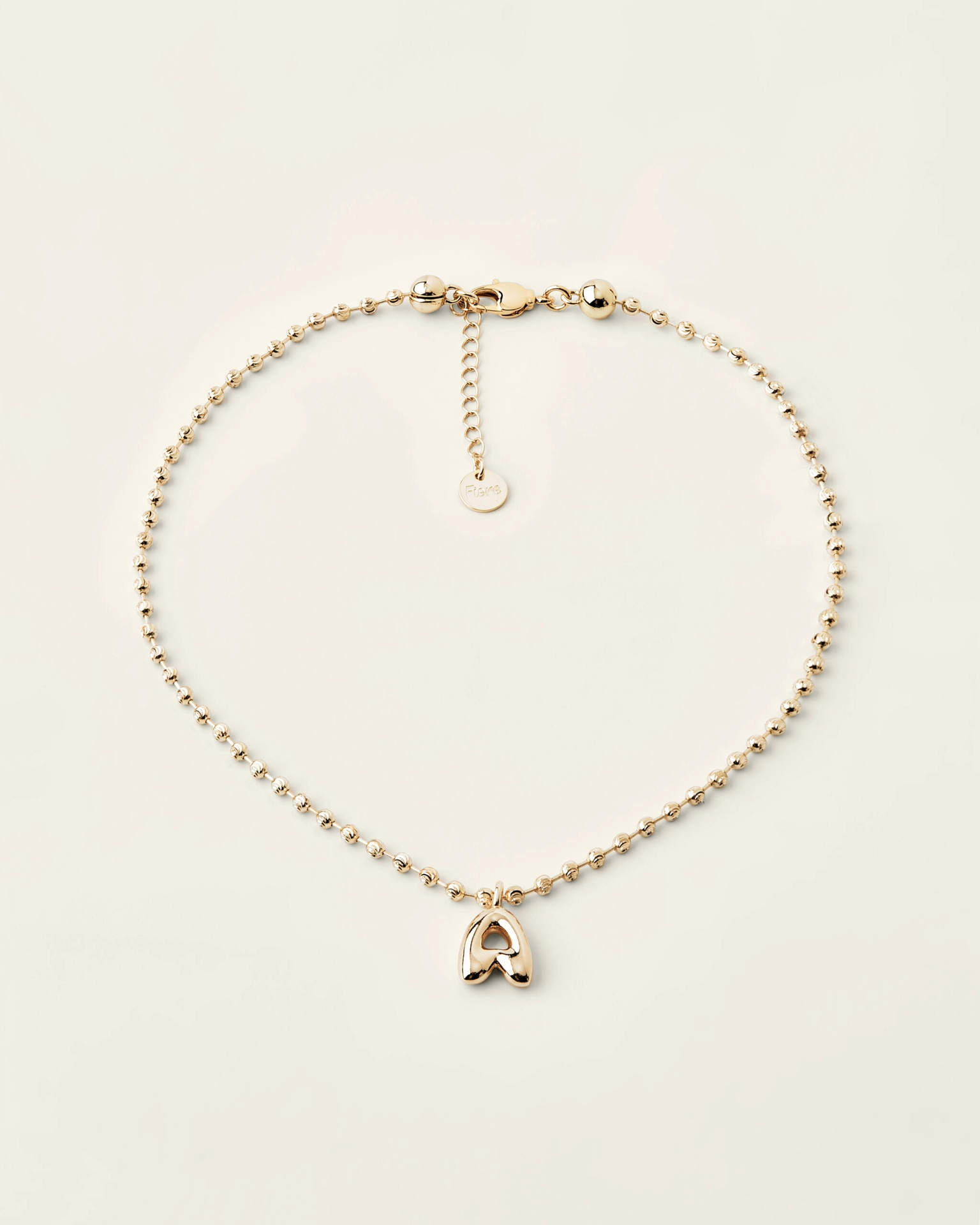 Цепочка-шарики с буквой Bubble small gold